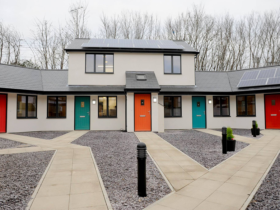launchpad houses with coloured doors
