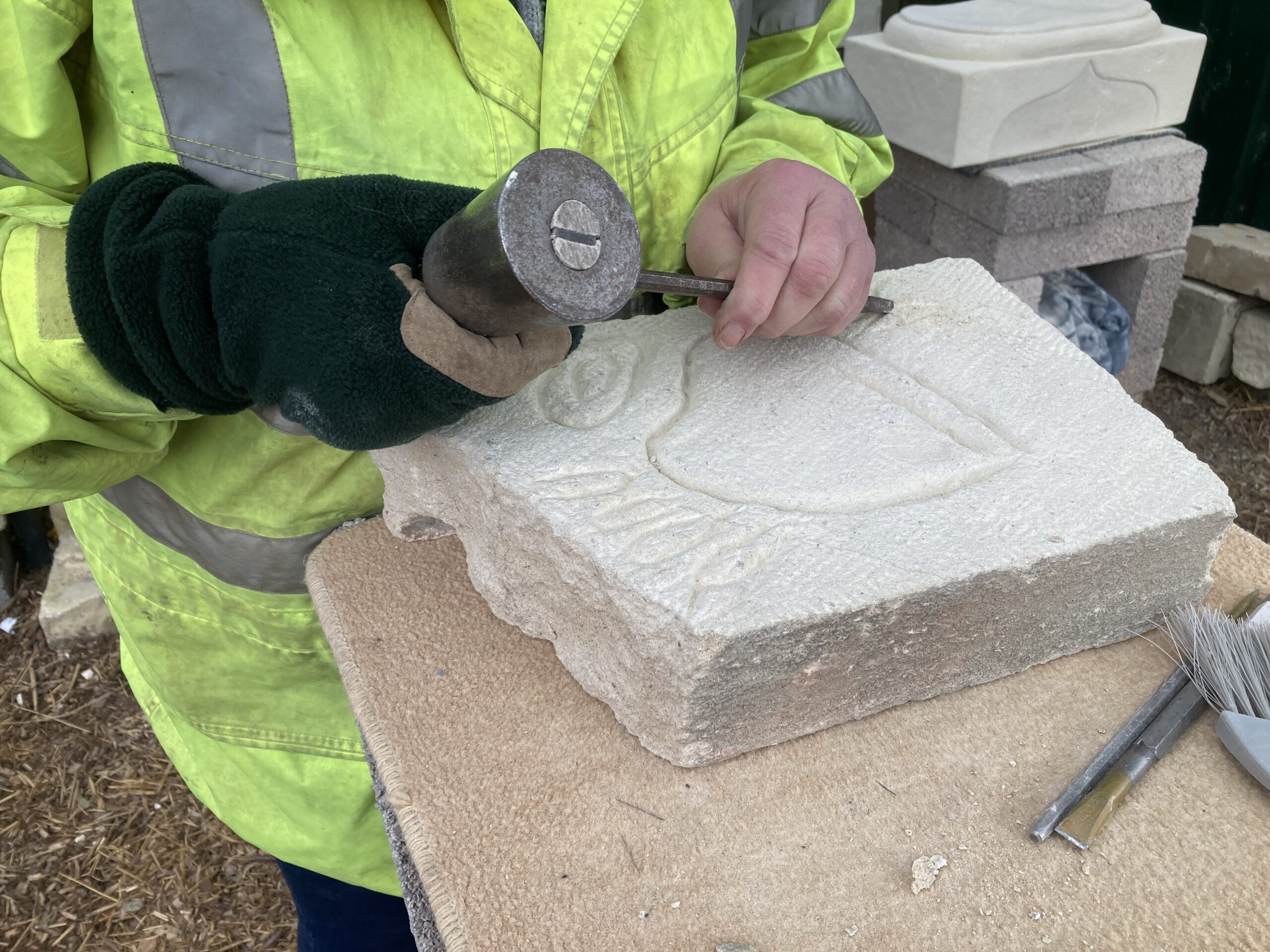 Andrew with a carving. Andrew teaches carving at Launchpad 135 - our work and life skills centre.