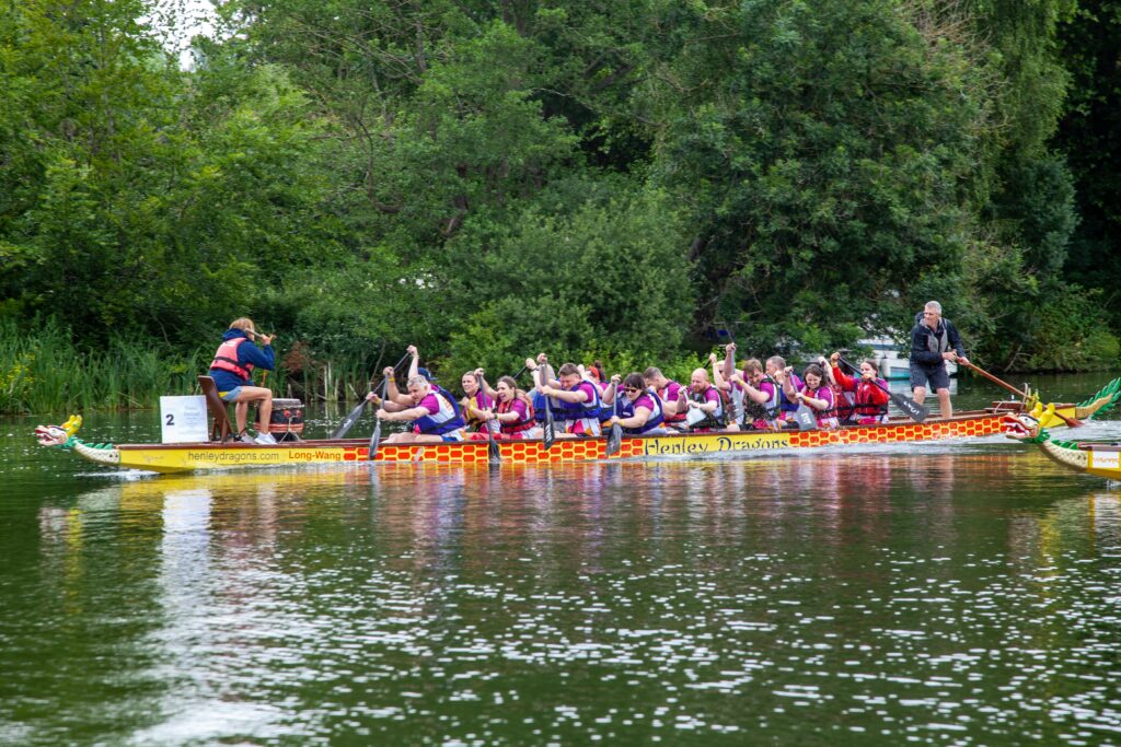 Team photo of people taking part in the Pangbourne Dragon Boat Race