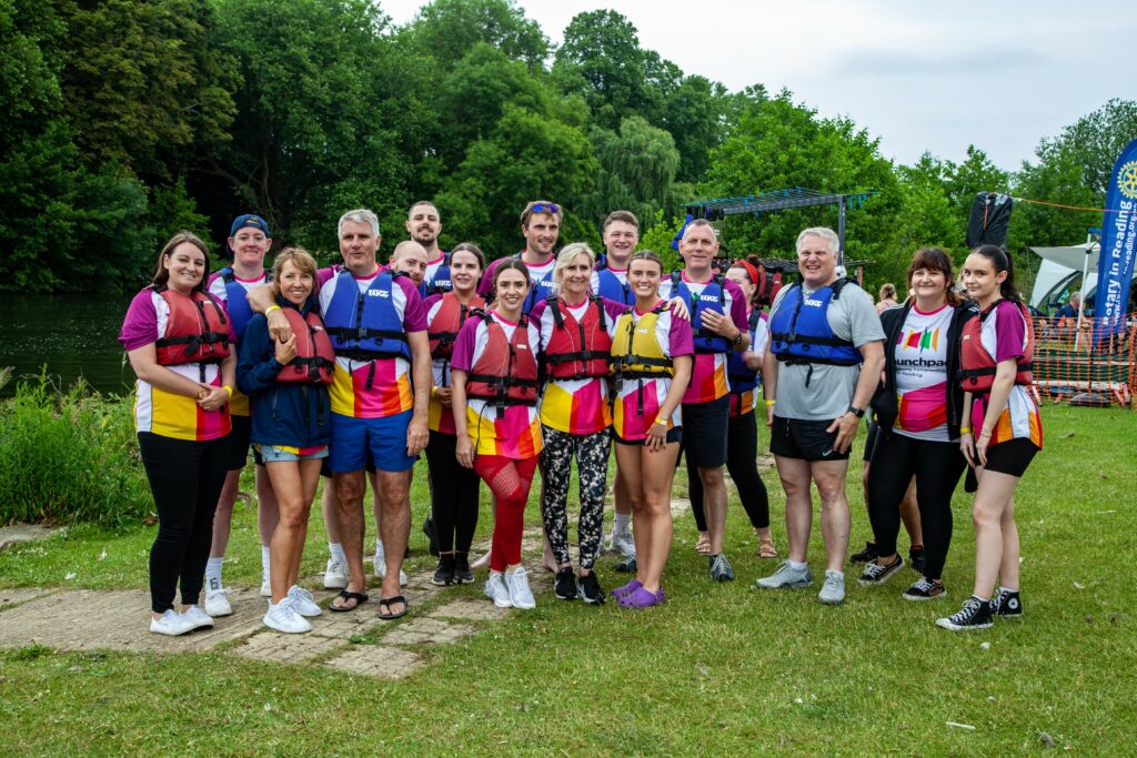 Team photo of people taking part in the Pangbourne Dragon Boat Race