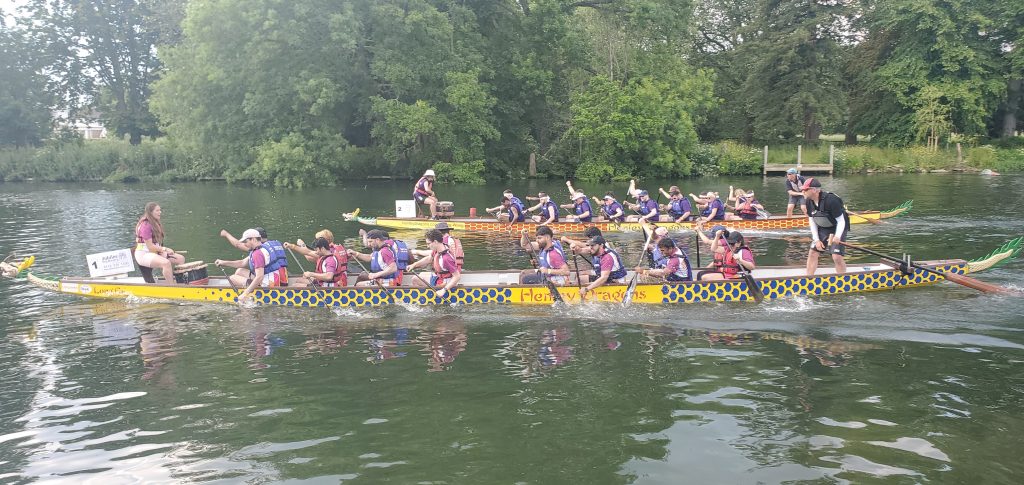 Paddlers taking part in a dragon boat race