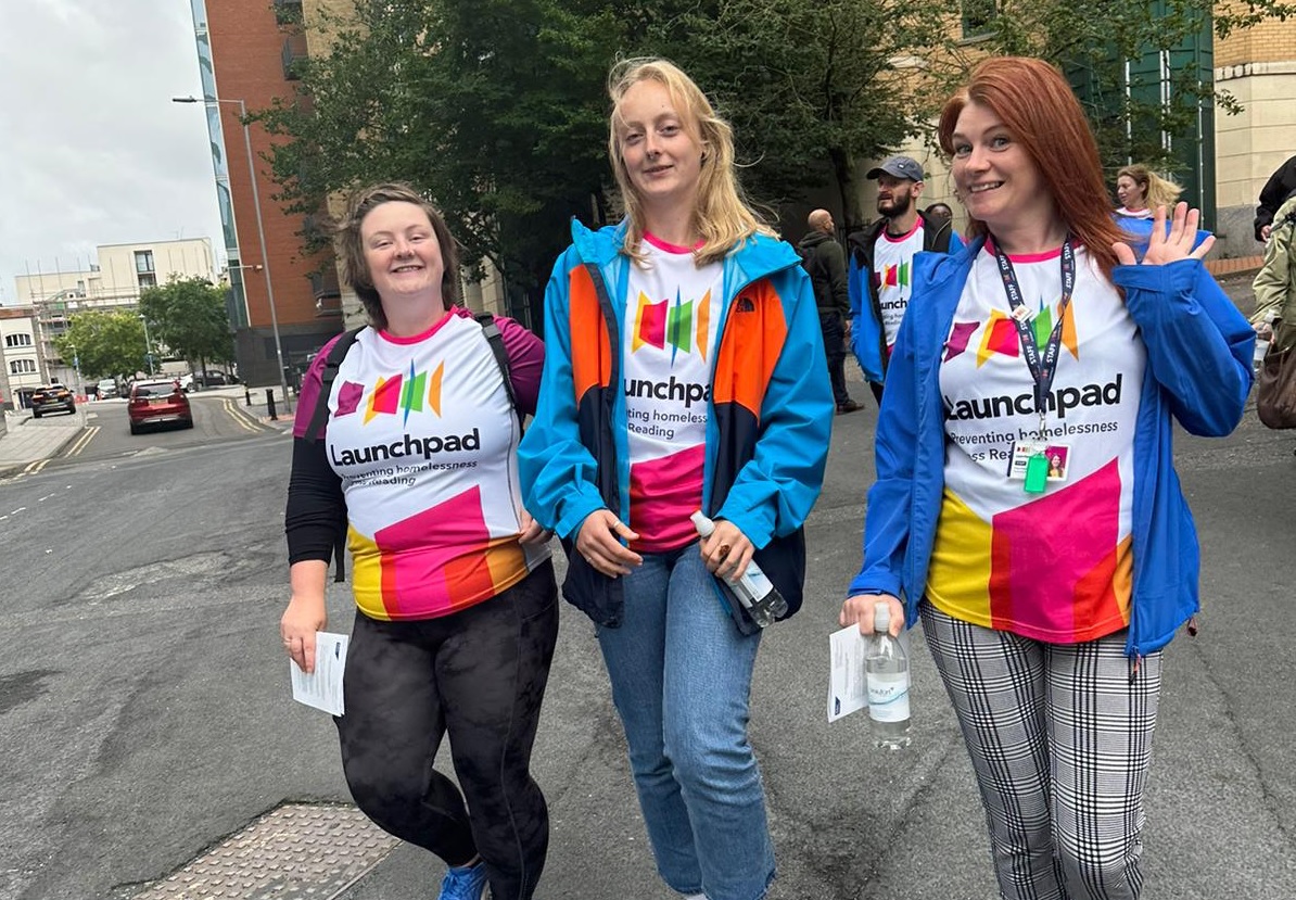 three women in Launchpad t-shirts on a walk