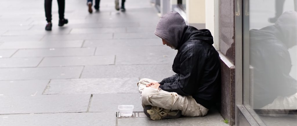 Photo of man begging. Illustrating begging in Reading.