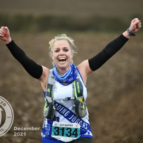 Woman taking part in Gut Buster run